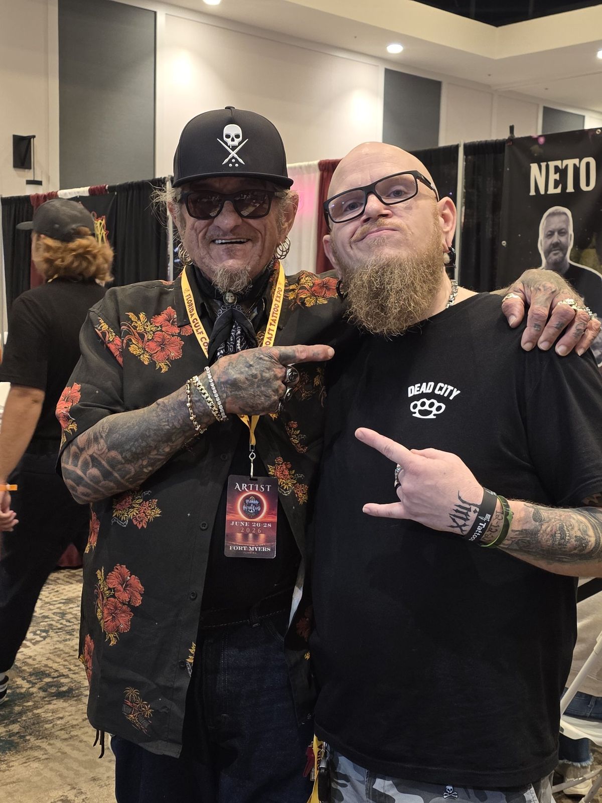 Tank posing with a fellow artist at the Florida Gulf Coast Tattoo Expo